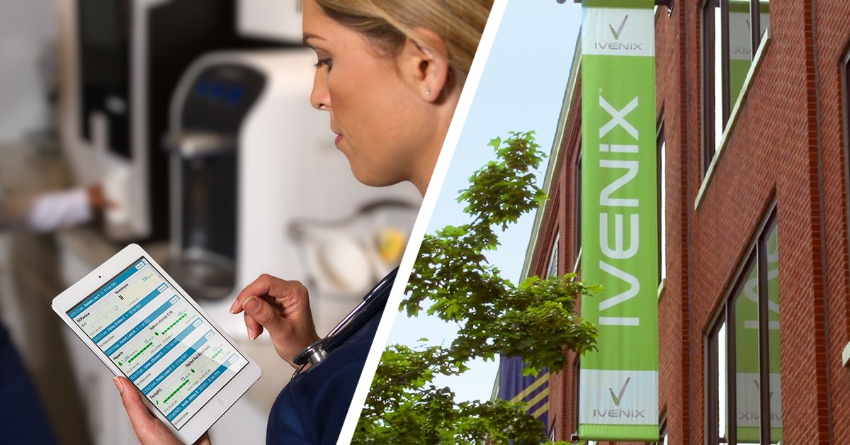 Person holding smartphone with medical app displayed, next to building with IVENIX sign