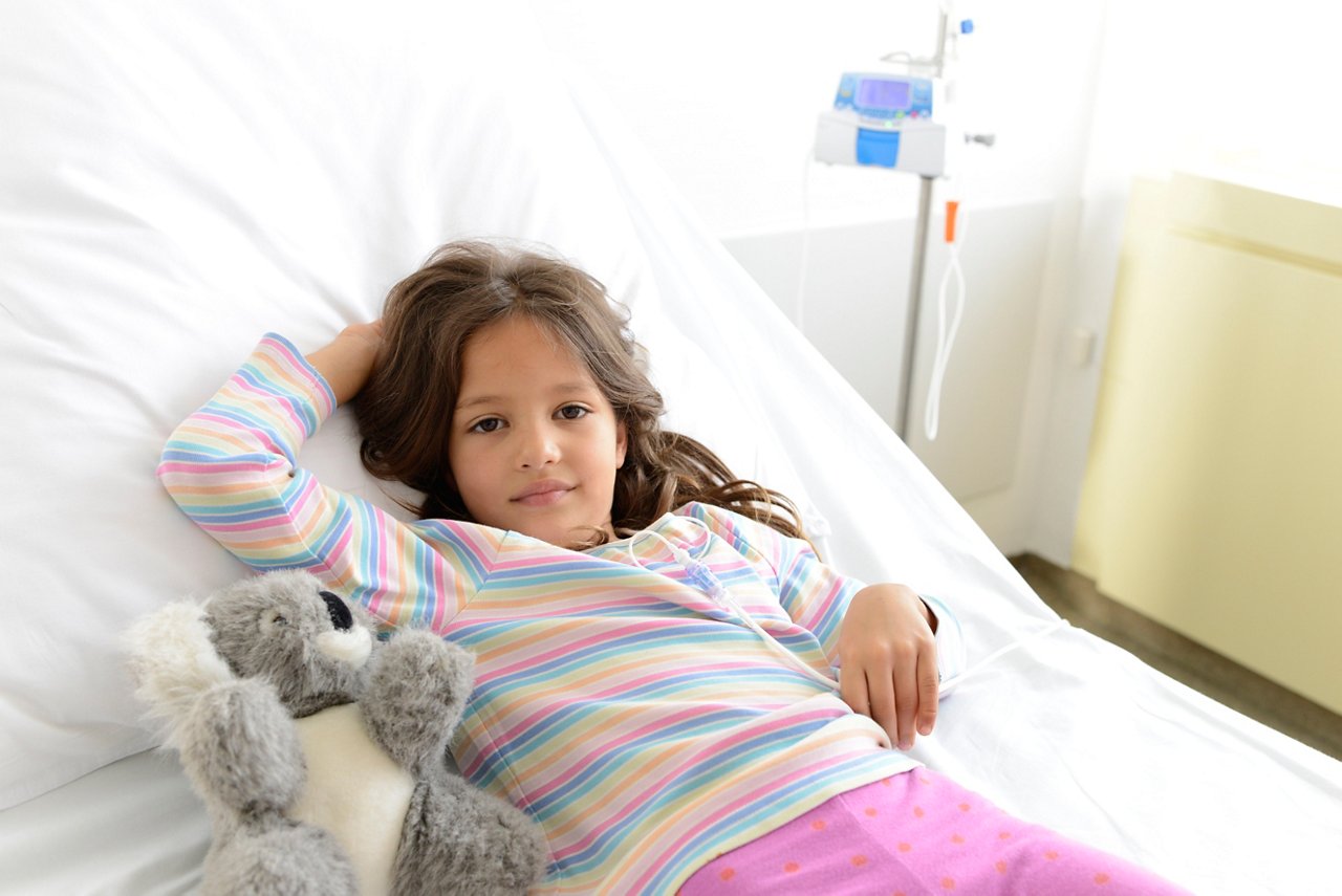 Child (girl) in hospital bed