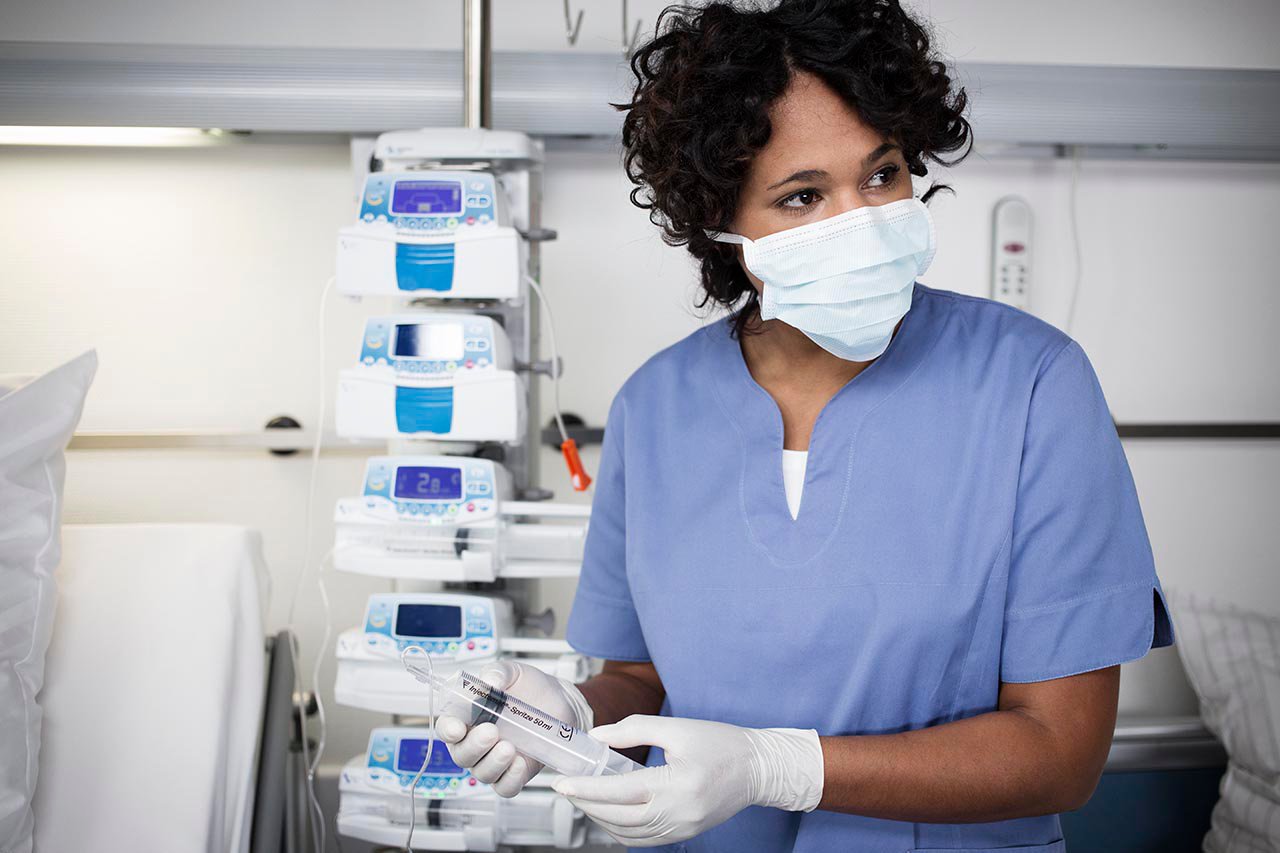 woman holding medicine 