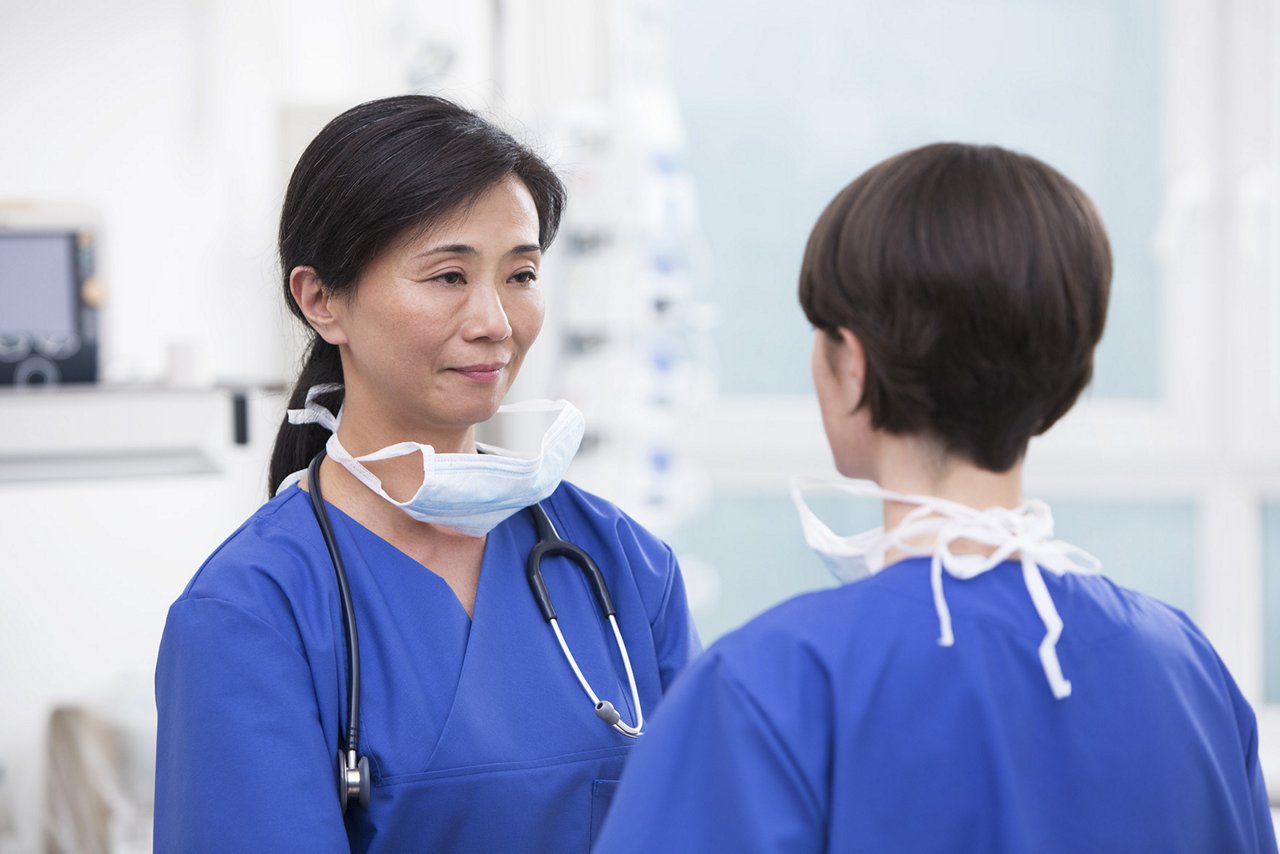 Nurses at ICU with Agilia blurred in background