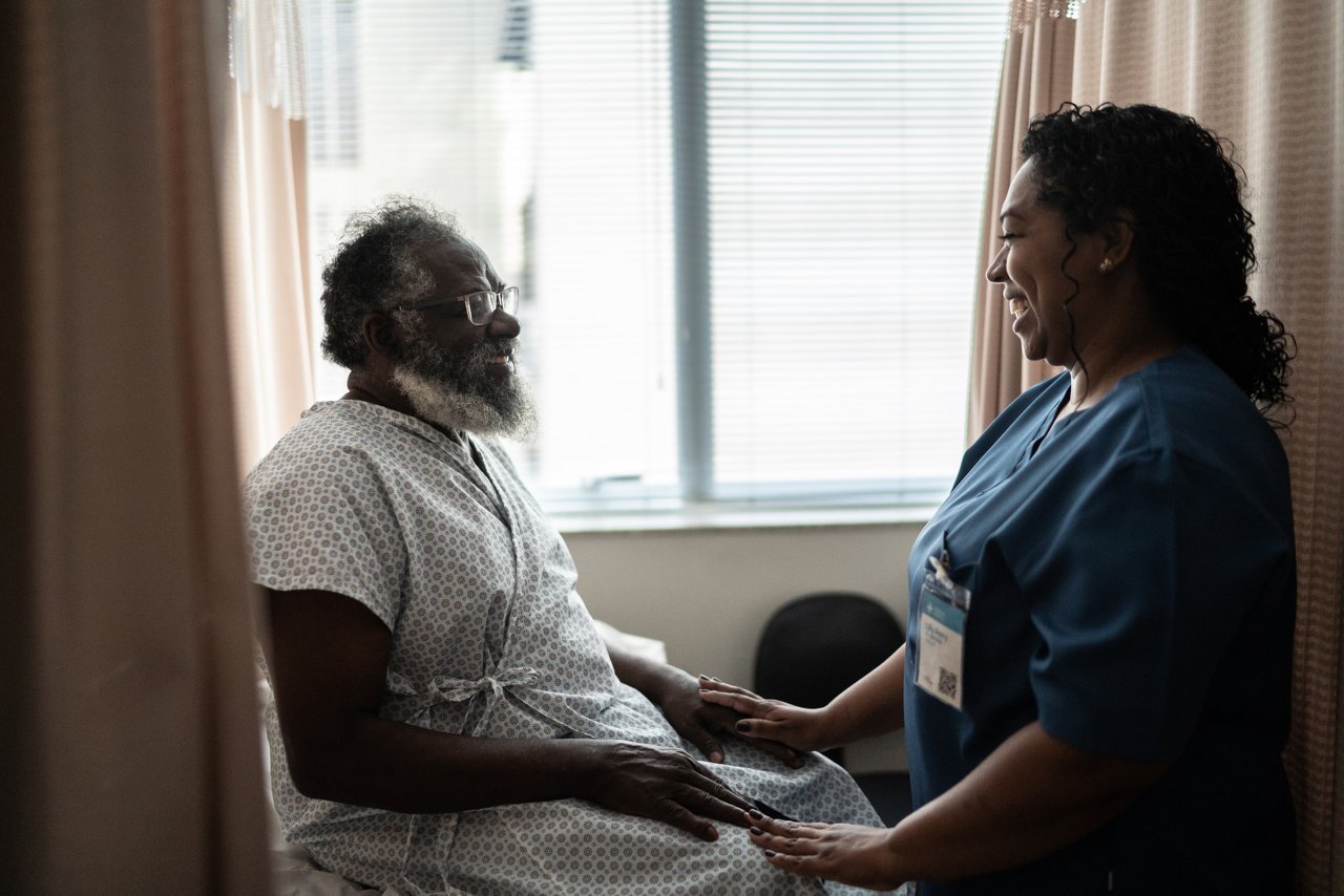 patient with infusion in hospital bed