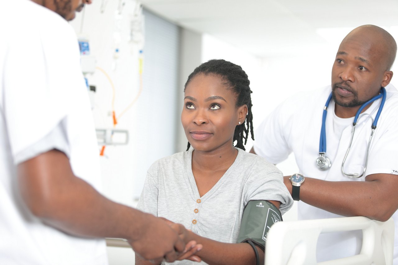 patient smiling with nurse