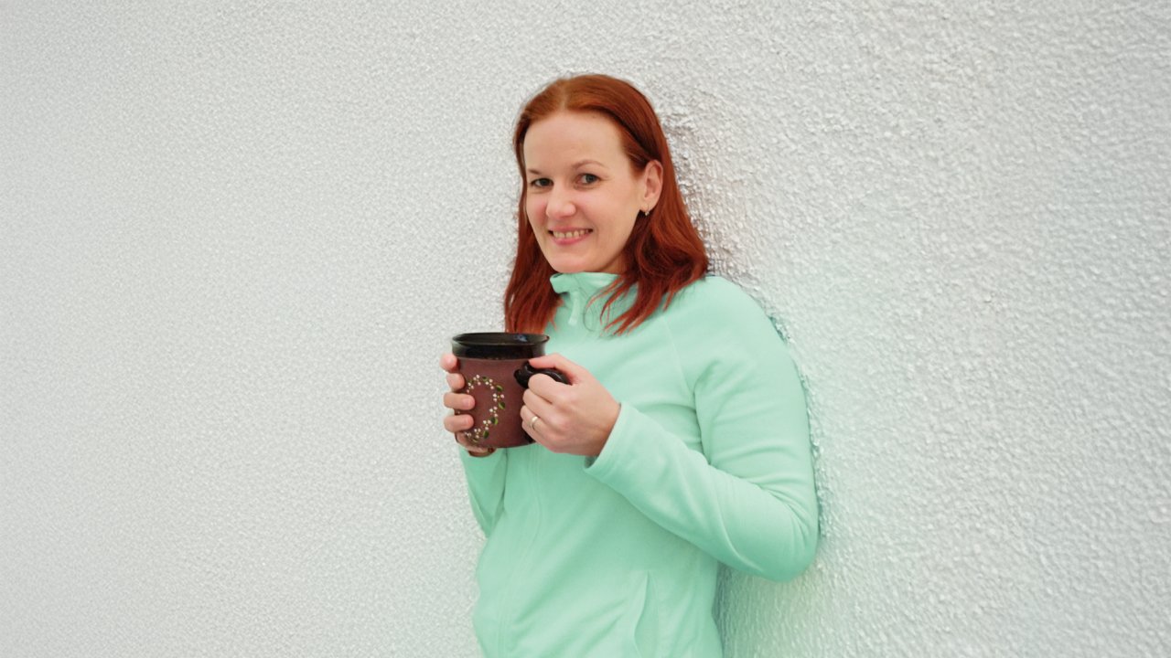 Denisa with her cup of fruit tea.