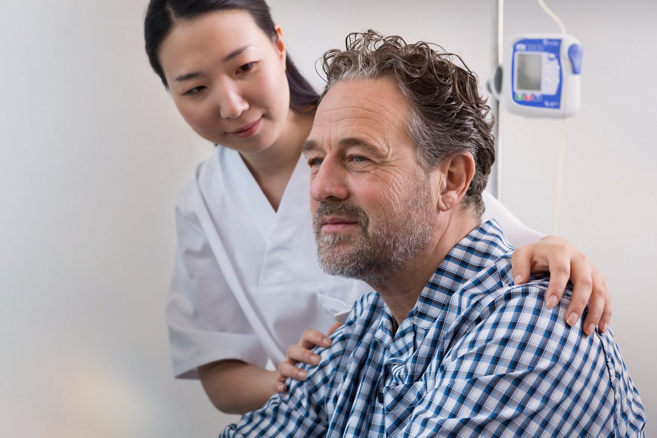 Nurse comforting a patient